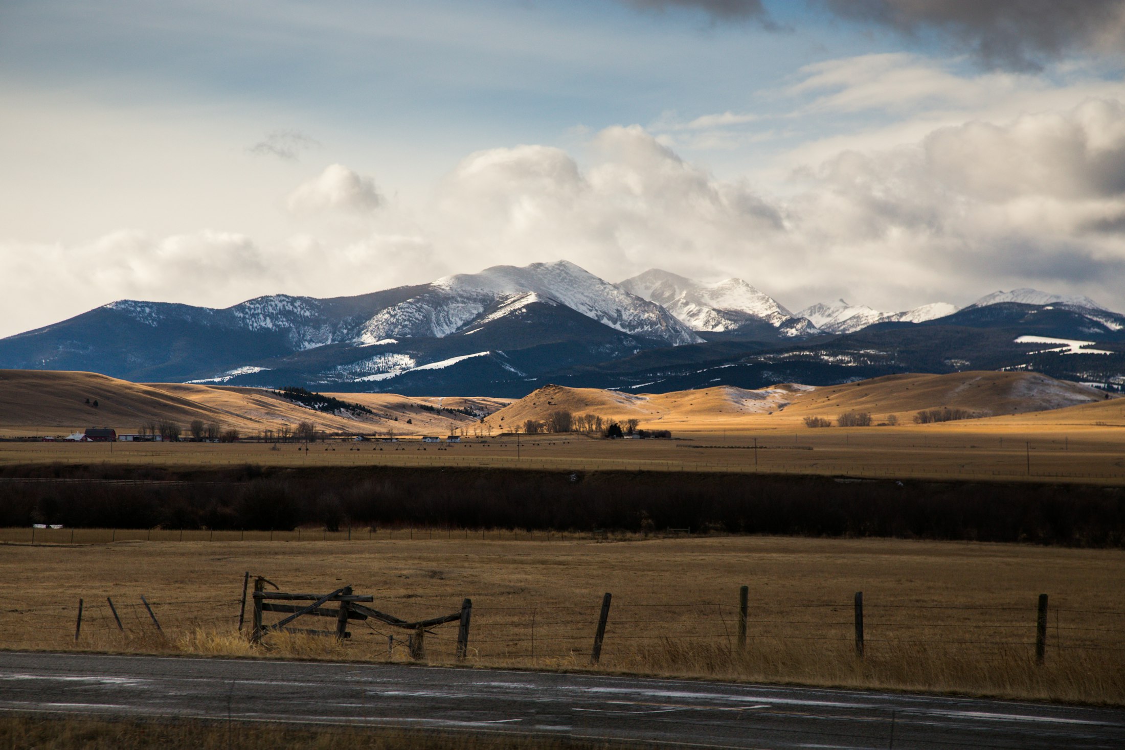 Montana mountain range over golden plains, Big Sky Country